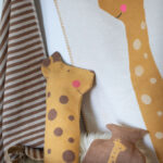 David Fussenewgger kinderdeken met knuffel giraffe Poldi